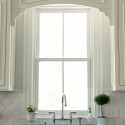 adorn-interiors-interior-design-newburyport-high-kitchen-sink-custom-cabinet-vanance-over-the-sink